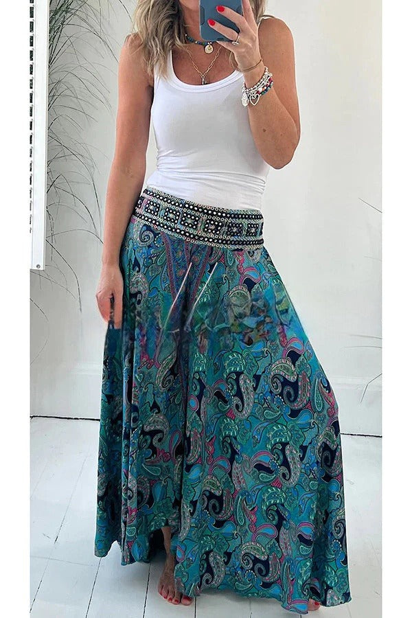 Elegantes pantalones ligeros con bolsillo y cintura elástica en atractivo estampado étnico de cachemira