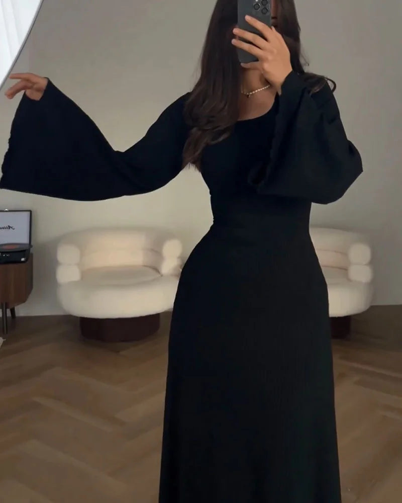 Vestido de punto Elena: Elegancia y estilo con lazo en la cintura