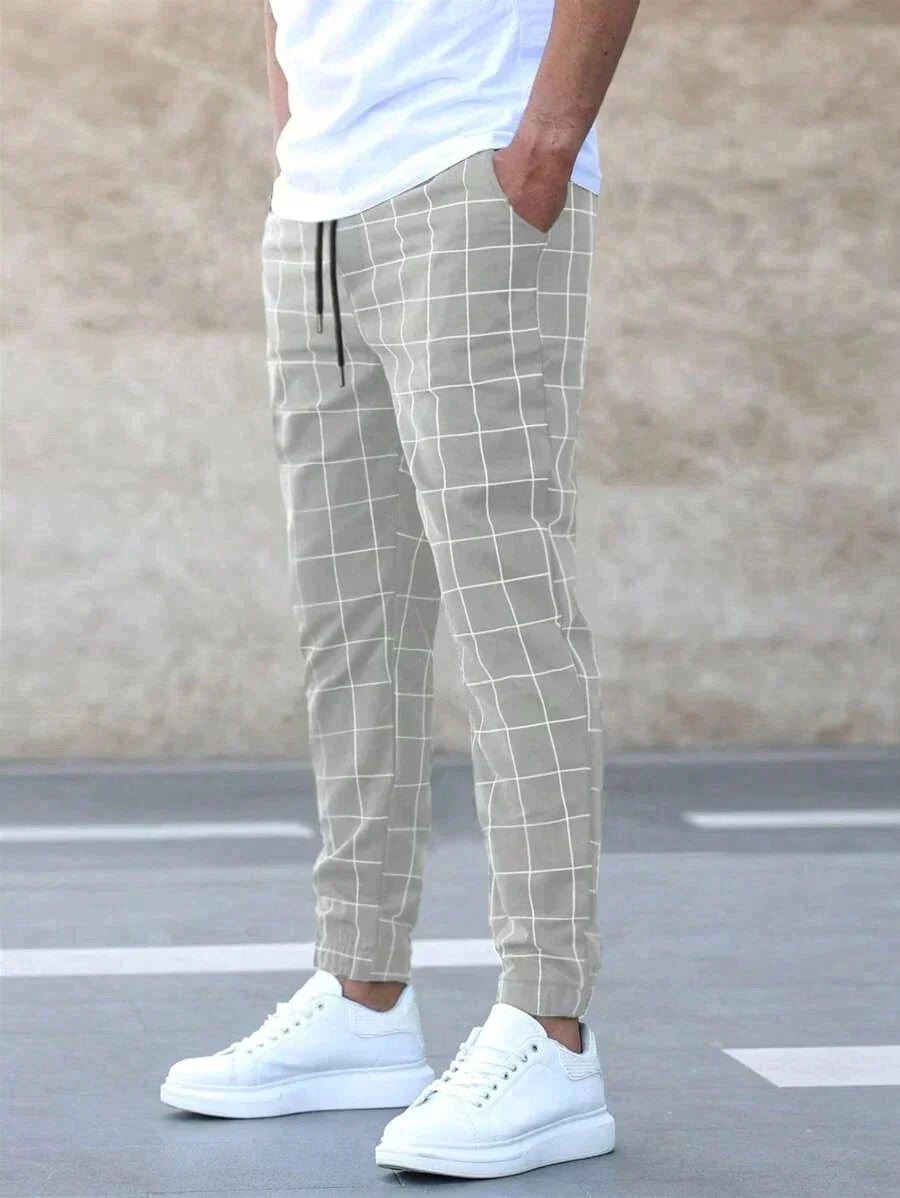 Pantalones para hombres con un elegante patrón de rejilla y corte moderno