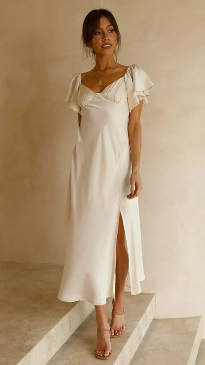 Elegante vestido midi marfil con encantadores hombros al aire