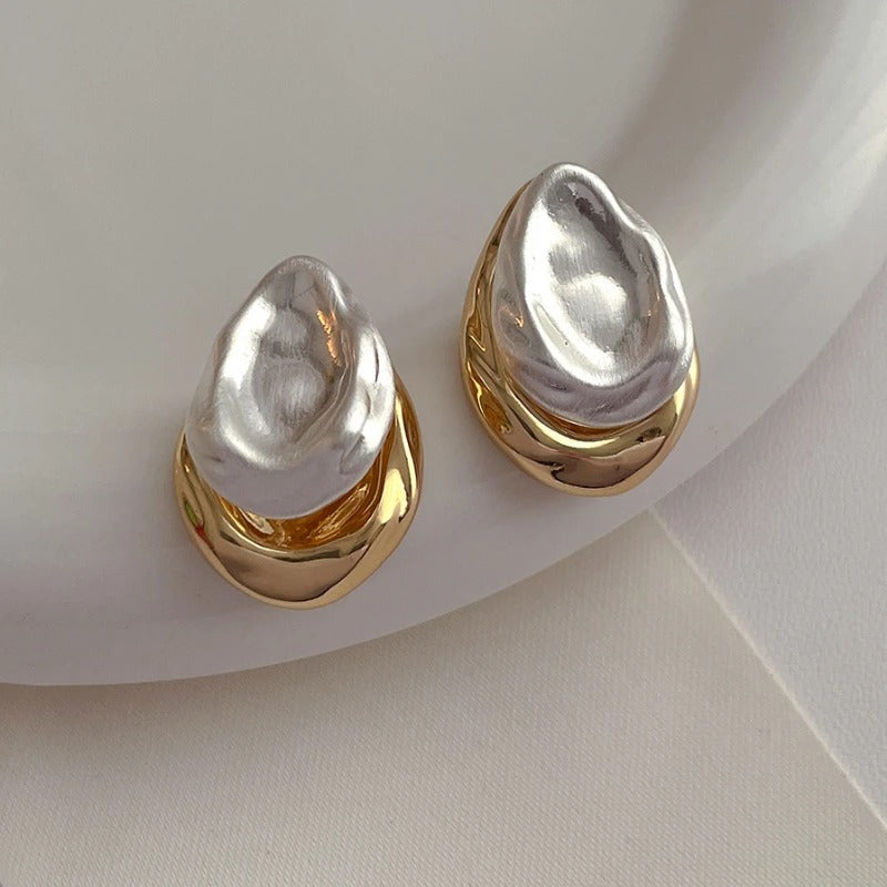 Pendientes dorados con perla barroca