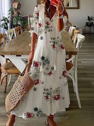Delia - Elegante vestido largo de mujer con cuello en V y mangas 3/4, adornado con un encantador estampado de barba