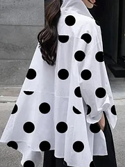 Blusa elegante de manga larga con botones y lunares, con sofisticada solapa lateral partida