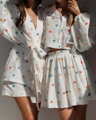 Conjunto de dos piezas con falda de encantador estampado de fresas y elegantes volantes de hojas en algodón a la moda