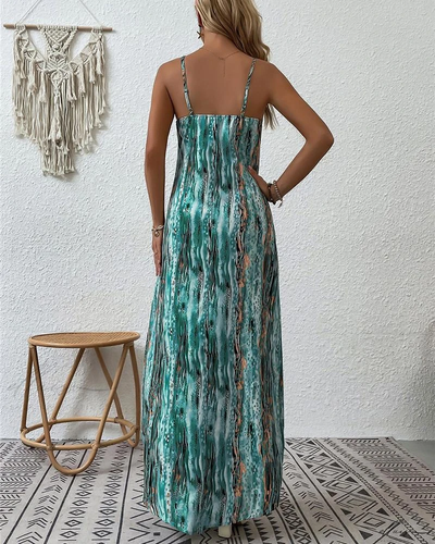 Maxivestido de tirantes Rebecca con estampado abstracto: Elegancia y estilo en cada paso.