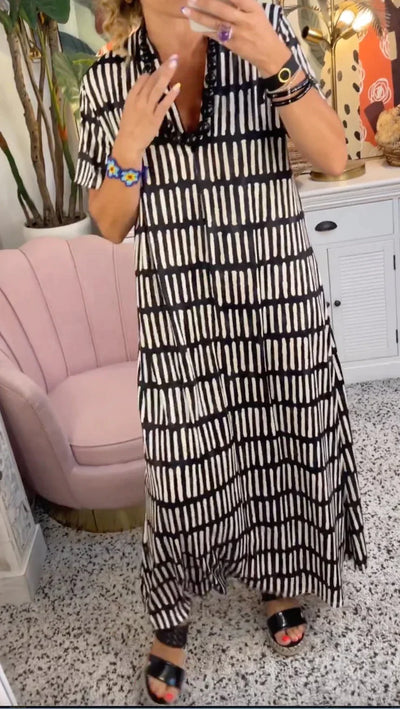 Elegante maxivestido de manga corta con sofisticado cuello en V