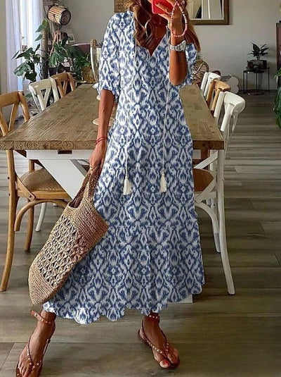 Delia - Elegante vestido largo de mujer con cuello en V y mangas 3/4, adornado con un encantador estampado de barba