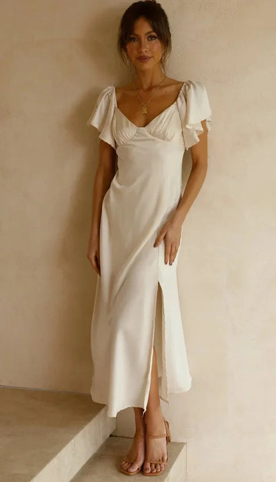 Elegante vestido midi marfil con encantadores hombros al aire