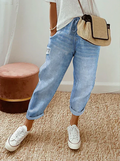 Lidia - Pantalones chic y frescos con detalles rasgados