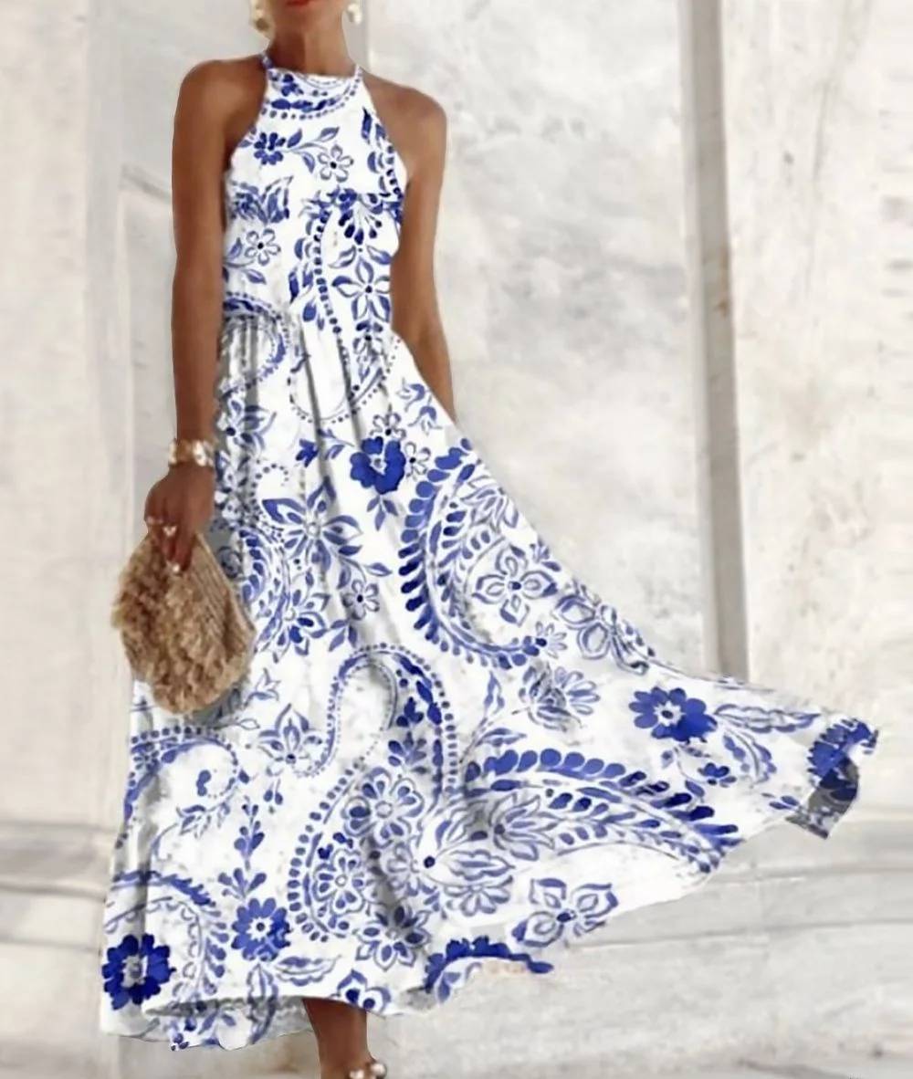 Vestido largo sin mangas Lucia con elegante cuello halter y vibrante estampado floral tribal para tus días de vacaciones bohemias