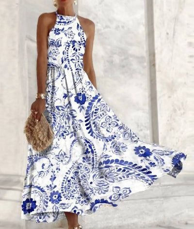 Vestido largo sin mangas Lucia con elegante cuello halter y vibrante estampado floral tribal para tus días de vacaciones bohemias