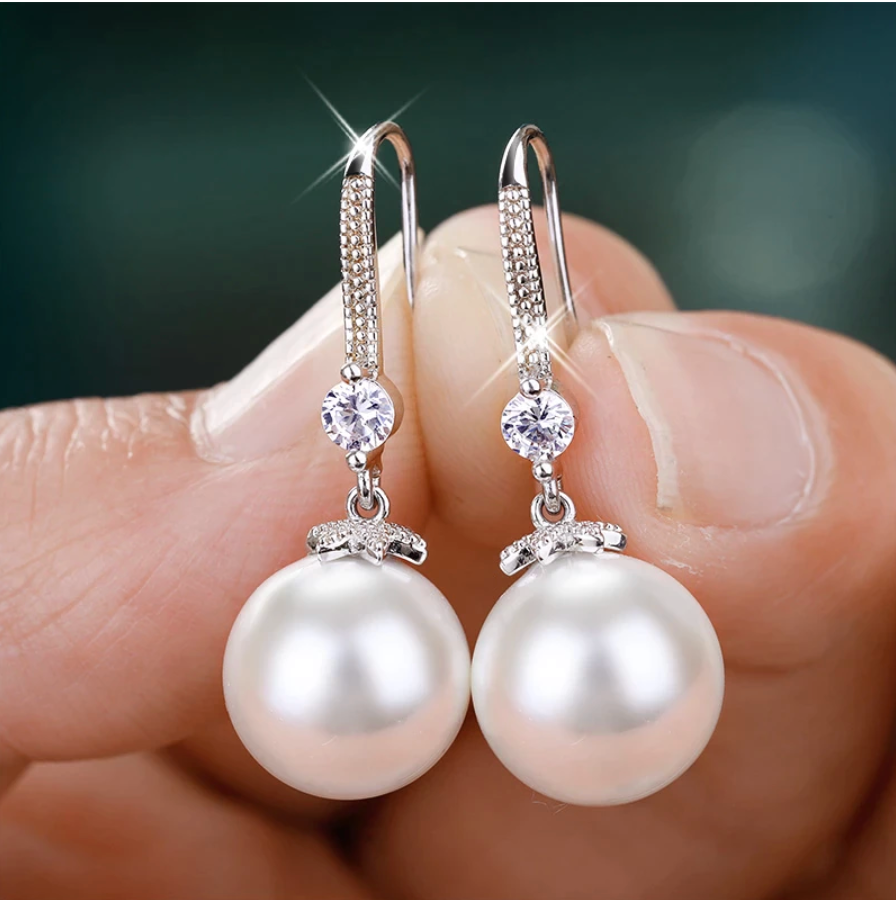 Pendientes de perlas en forma redonda