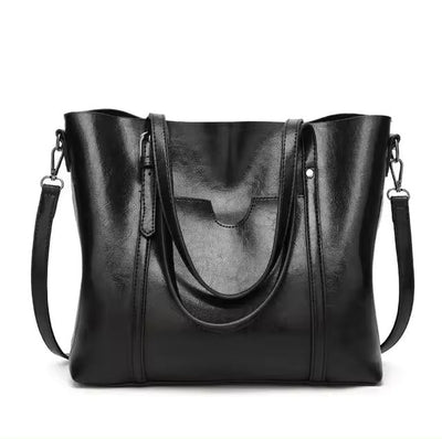 Quinn™ - Elegante bolso de cuero para transporte