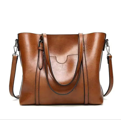 Quinn™ - Elegante bolso de cuero para transporte