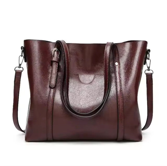 Quinn™ - Elegante bolso de cuero para transporte