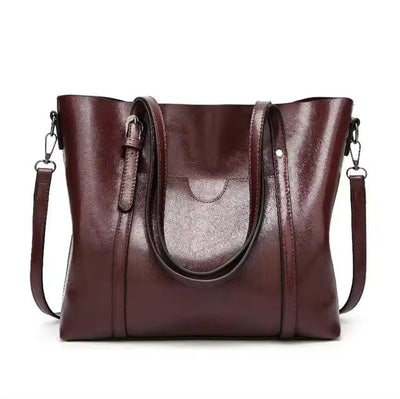 Quinn™ - Elegante bolso de cuero para transporte