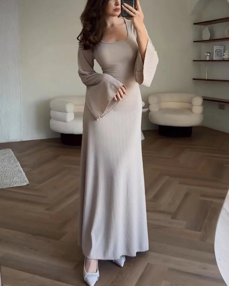 Vestido de punto Elena: Elegancia y estilo con lazo en la cintura