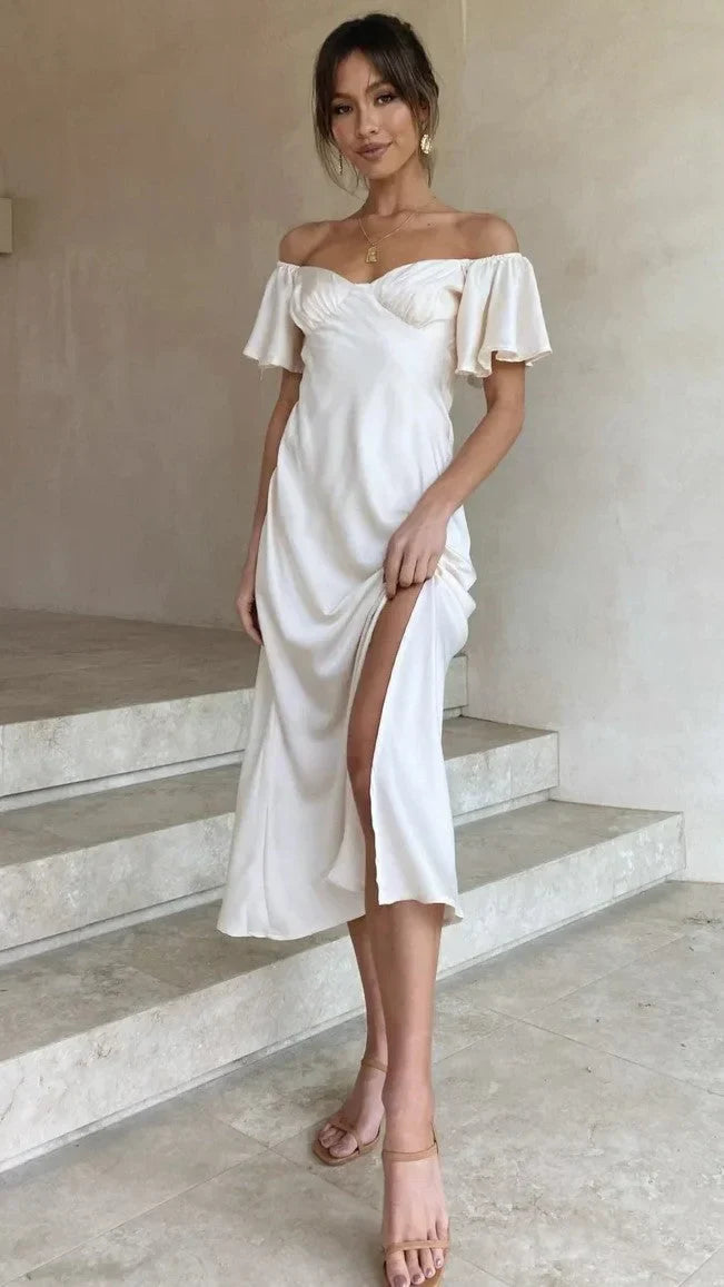 Elegante vestido midi marfil con encantadores hombros al aire