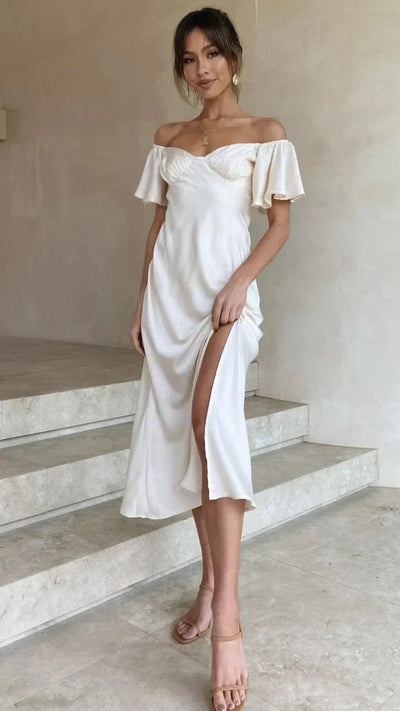 Elegante vestido midi marfil con encantadores hombros al aire