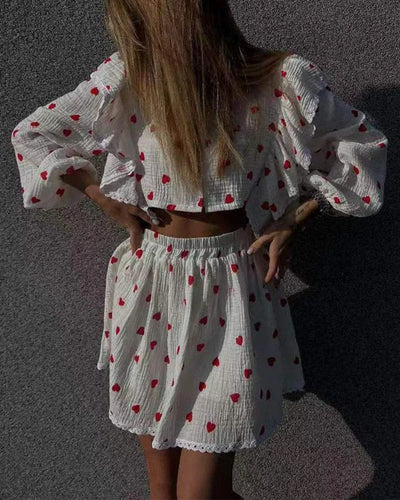 Conjunto de dos piezas con falda de encantador estampado de fresas y elegantes volantes de hojas en algodón a la moda